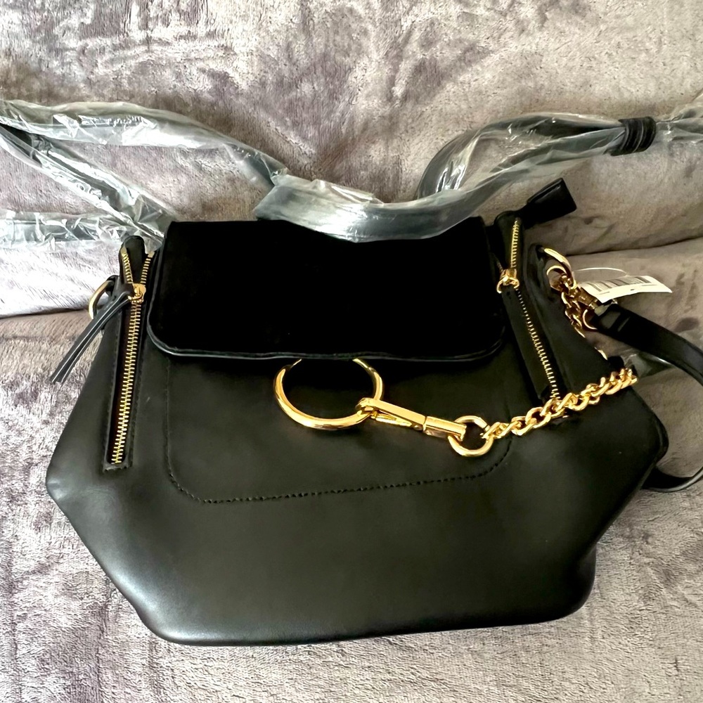 BRAND NEW- Moda Luxe black backpack purse with gold accents